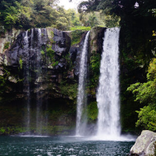 drinking water from a waterfall