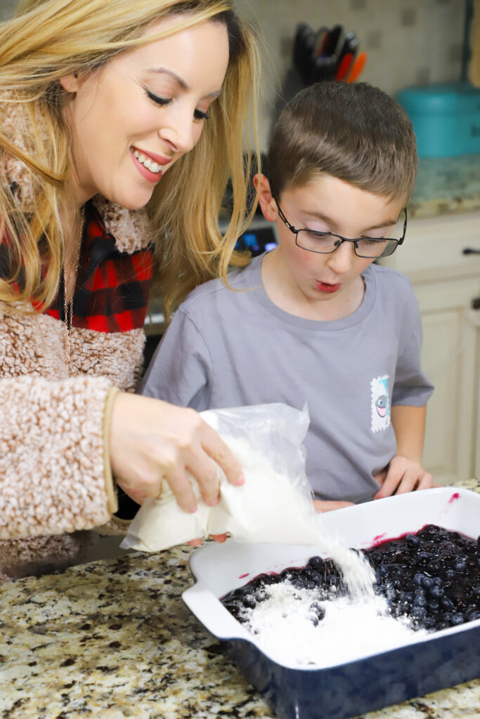 pour cake mix over blueberry pie filling