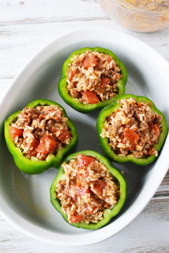 transfer stuffed peppers to casserole dish